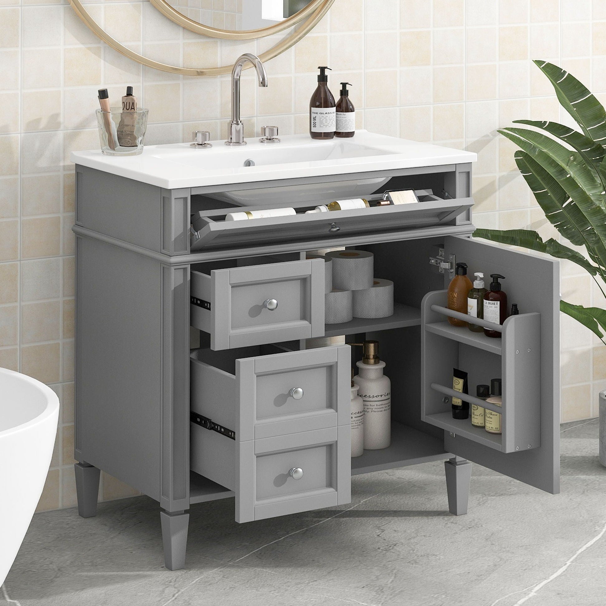 Bathroom vanity with top sink by HouseOfZazla, gray cabinet, white countertop, chrome faucet, two drawers plus tip-out drawer, towels on shelf on Tampa Home & Garden Store