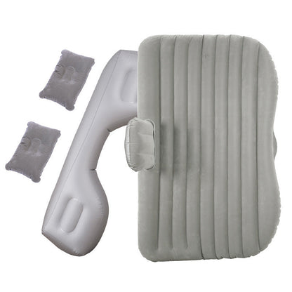 Inflatable car mattress with ribbed gray sleeping pad, headrest pillow, and two small cushions on Tampa Home & Garden Store