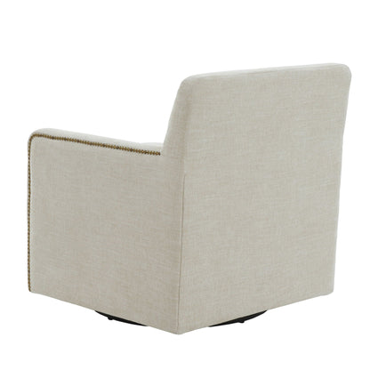 Beige swivel accent chair with antique brass nailhead trim by HouseOfZazla on Tampa Home & Garden Store
