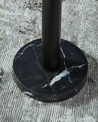 Sorcha metal floor lamp black cylindrical stem atop round black marble base with white veining on Tampa Home & Garden Store