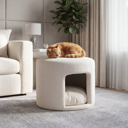 Beige pet-friendly ottoman with removable cushion and hidden nook, cat resting on top on Tampa Home & Garden Store