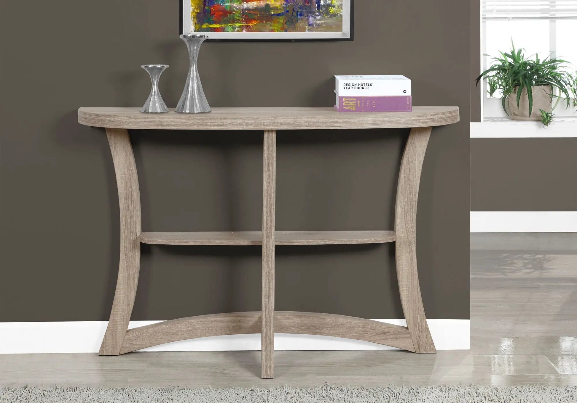 Accent console table for entryway in taupe wood finish with curved legs and two silver vases on Tampa Home & Garden Store