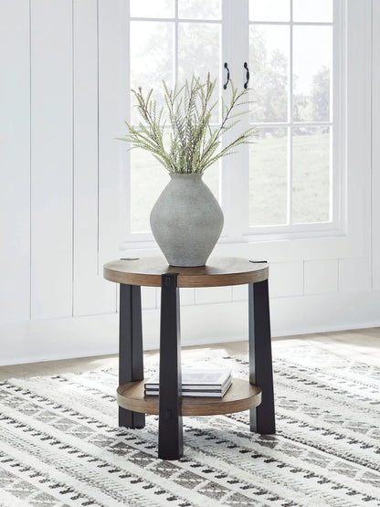 Ridgester Round Table; wood top, black legs, vase with greenery by Unique Piece Furniture on Tampa Home & Garden Store