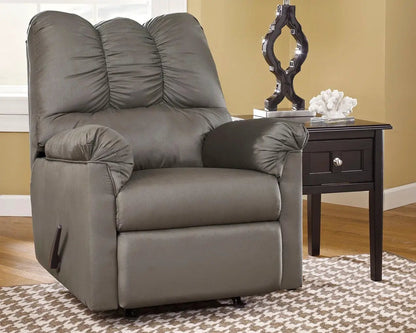 Darcy rocker recliner in gray leather with side lever beside a dark end table on Tampa Home & Garden Store