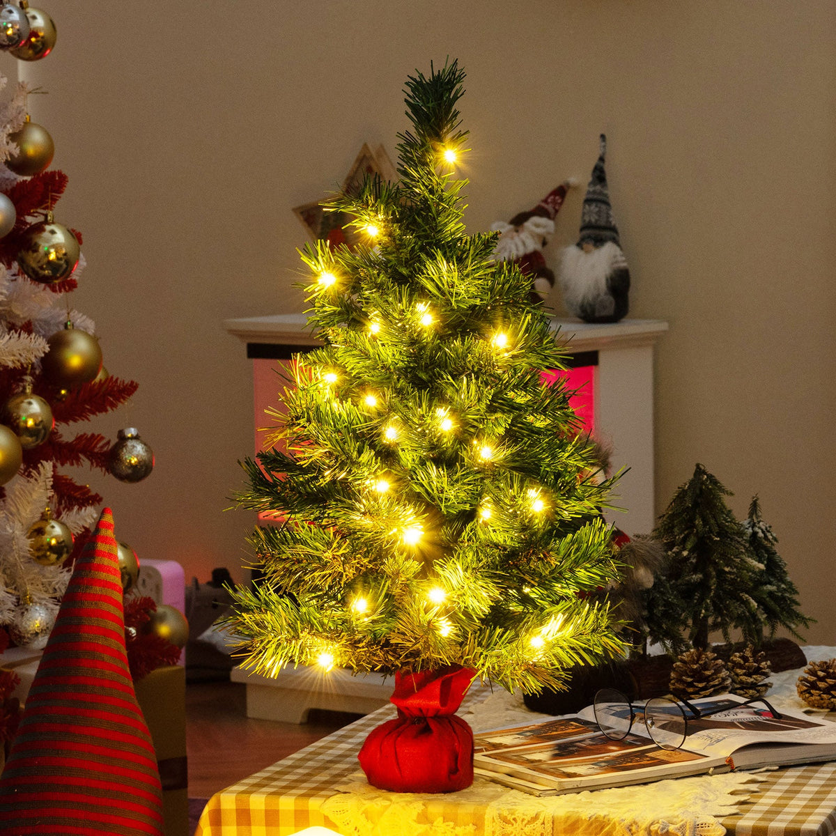 24 Inch Mini Pre-Lit Tabletop Fir Christmas Tree with warm lights among two trees DirectDeals on Tampa Home & Garden Store