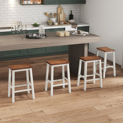 4 Saddle Bar Stools with footrests, 24.5 in, white legs and dark wood seats at kitchen island on Tampa Home & Garden Store