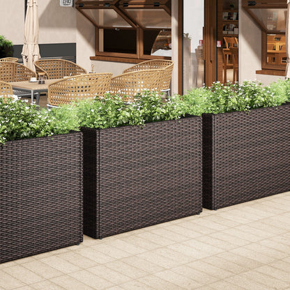 24 Inch Tall Raised Garden Bed All-Weather PE Rattan Wicker Flowerpot with Liner, dark brown planters filled with greenery along a patio on Tampa Home & Garden Store