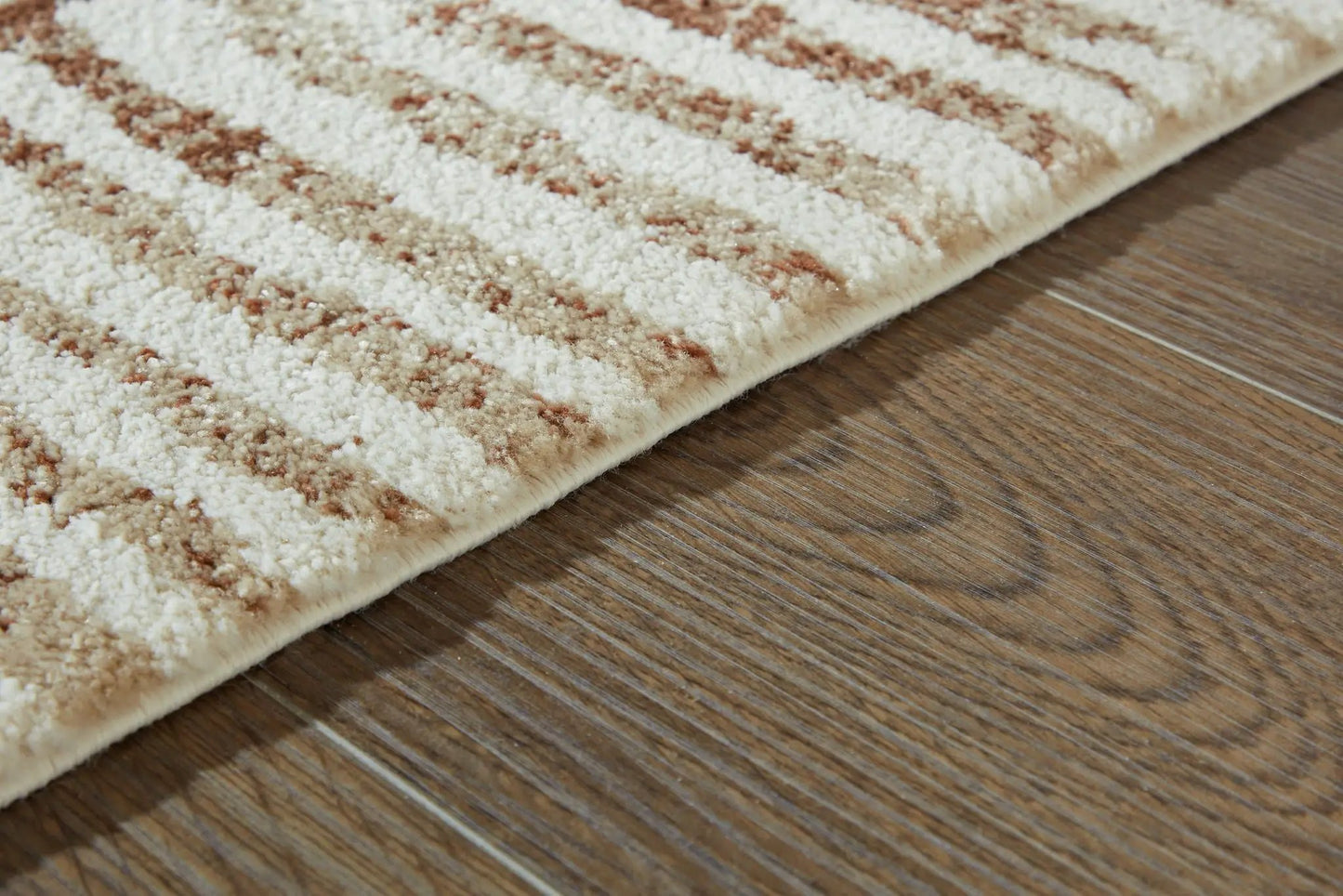 Uduak rug, beige cream and brown abstract pattern, plush pile, bound edge on Tampa Home & Garden Store