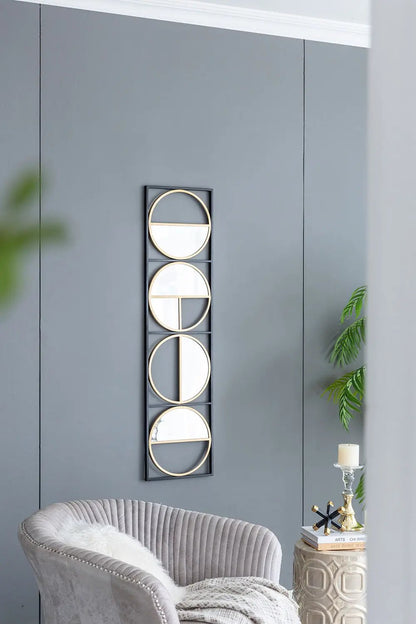 Eclectic metal beaded wall mirror with vertical black frame and four round mirrors on Tampa Home & Garden Store