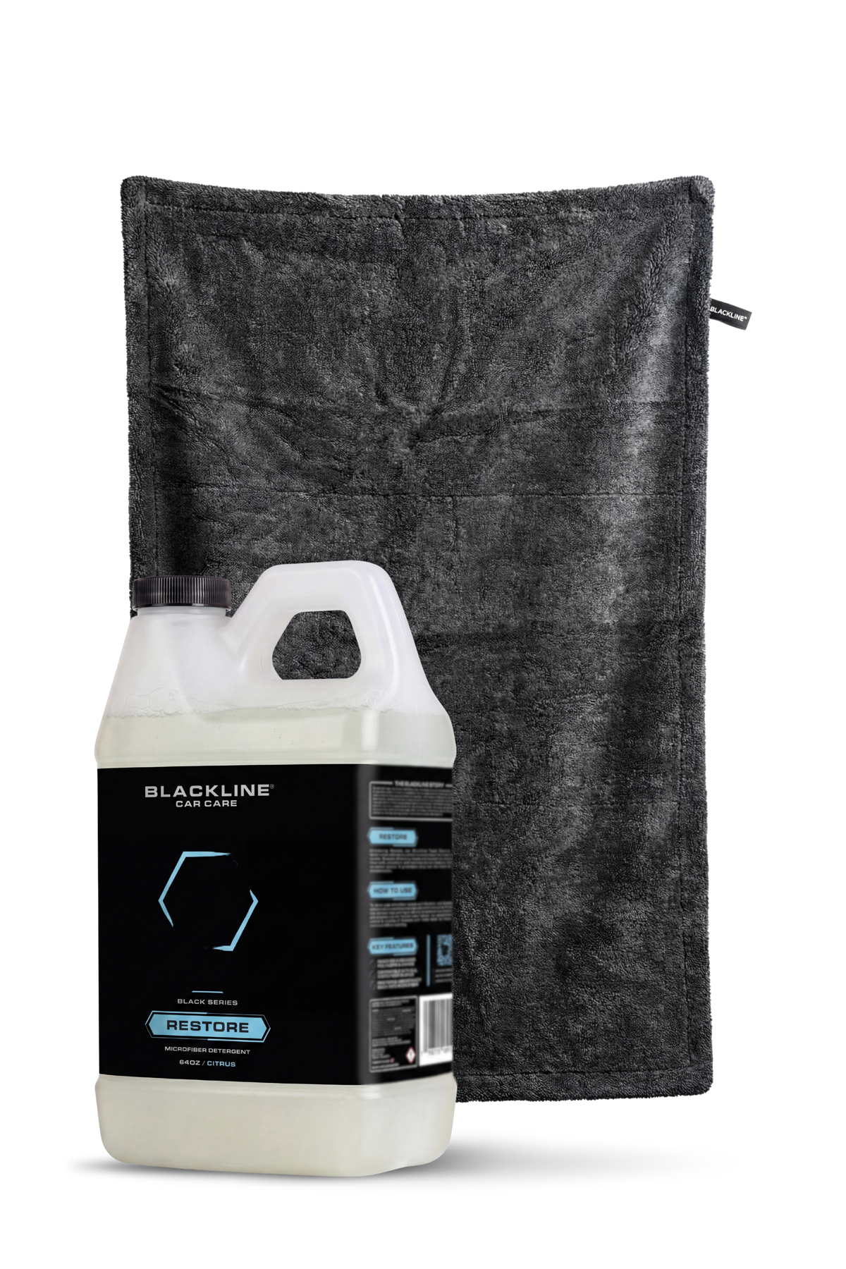 Blackline Restore microfiber detergent bottle beside 1 large black microfiber towel on Tampa Home & Garden Store