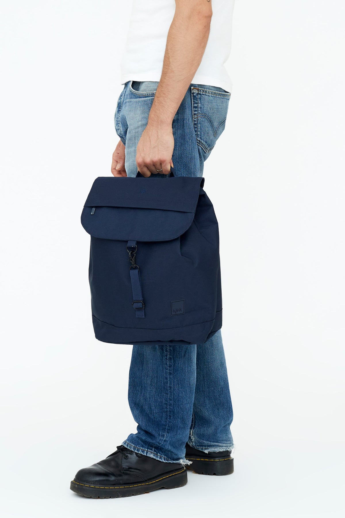 Lefrik USA Kaut Backpack Navy with 19L laptop pocket carried by top handle on Tampa Home & Garden Store