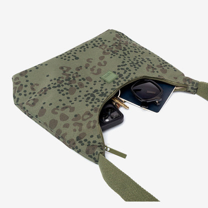 Bico Bag crossbody in olive cheetah print by Lefrik USA; shows phone and sunglasses inside on Tampa Home & Garden Store