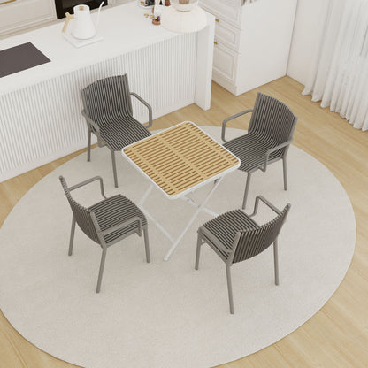 4 modern stackable grey plastic armchairs with folding square table featuring a slatted wood top on Tampa Home & Garden Store