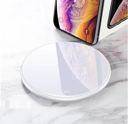 Wireless charger pad FLIPSTYLEZLLC, round white fast-charge pad with phone nearby on Tampa Home & Garden Store