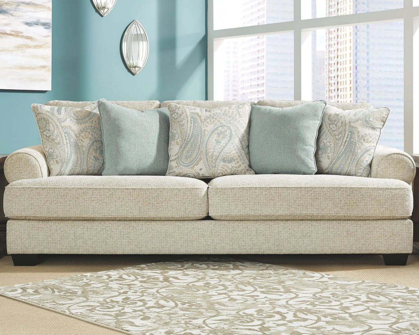 Monaghan sandstone sofa by Unique Piece Furniture, beige woven fabric with blue cushions on Tampa Home & Garden Store