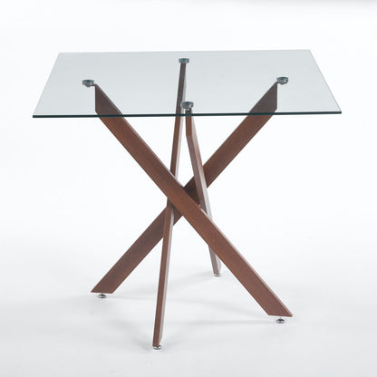 Dining table from HouseOfZazla with tempered glass top and cross wooden legs on Tampa Home & Garden Store