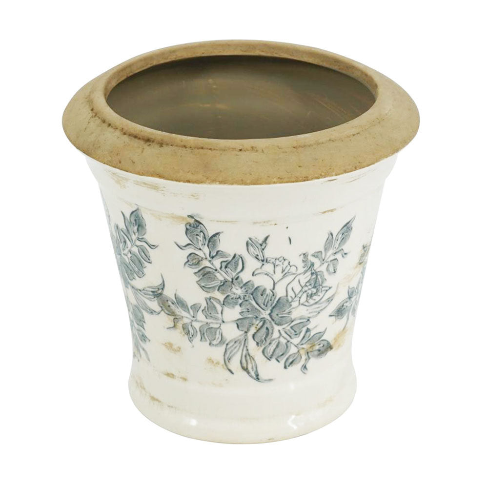 Ceramic planter with blue floral pattern, white glaze, brown rim on Tampa Home & Garden Store