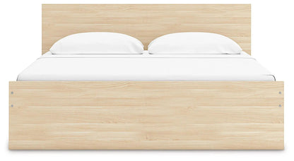 Onita panel platform bed by Unique Piece Furniture in natural oak with tall headboard and white bedding on Tampa Home & Garden Store