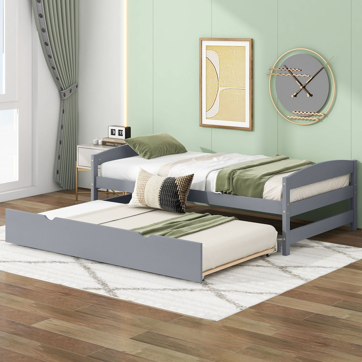 Platform bed with trundle in gray-blue finish, twin beds with green bedding on Tampa Home & Garden Store