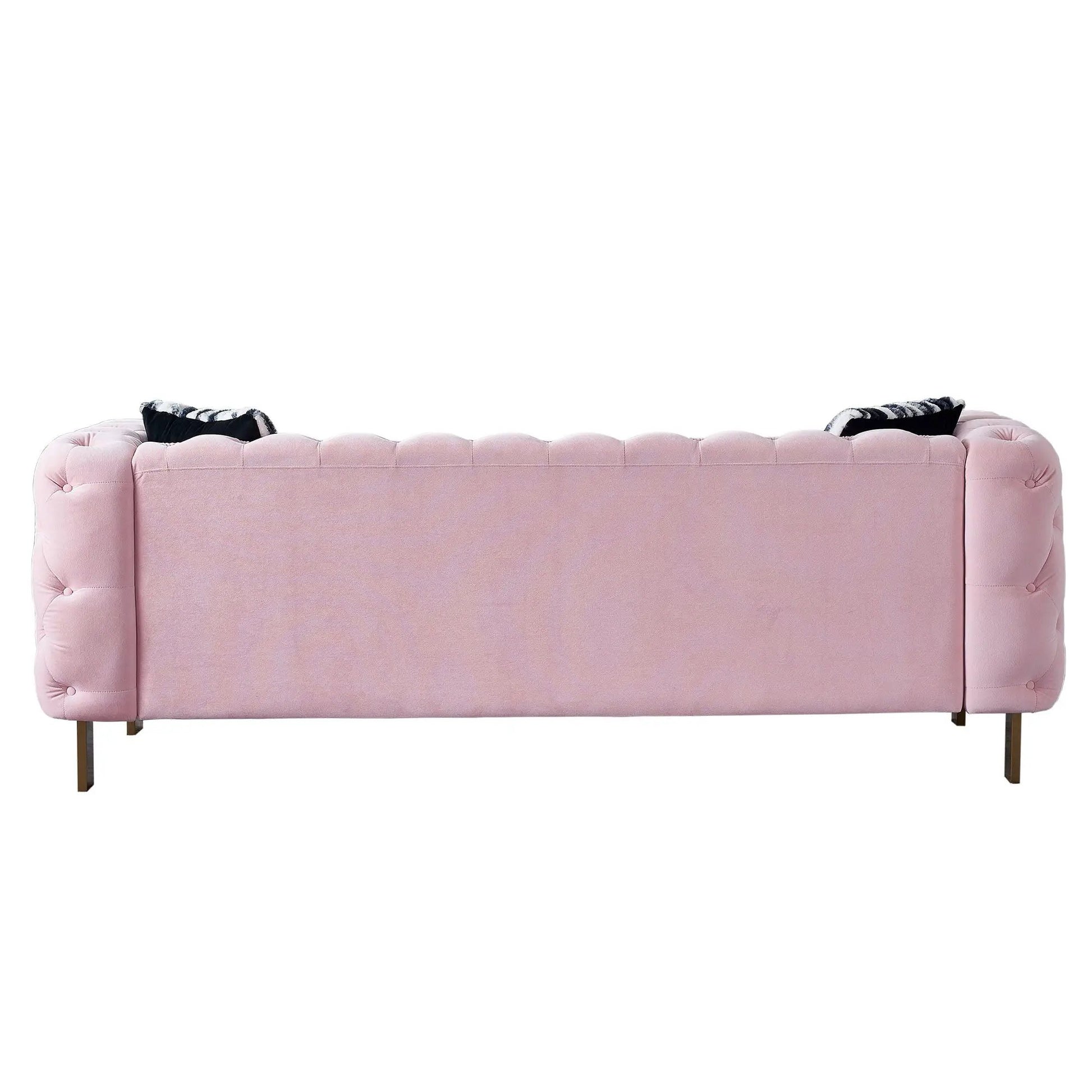 Chesterfield pink velvet tufted sofa with rolled arms and metal legs in a soft pastel hue on Tampa Home & Garden Store