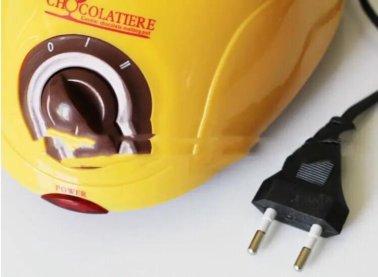 Yellow electric chocolate melting pot with brown rotary dial and European plug on Tampa Home & Garden Store