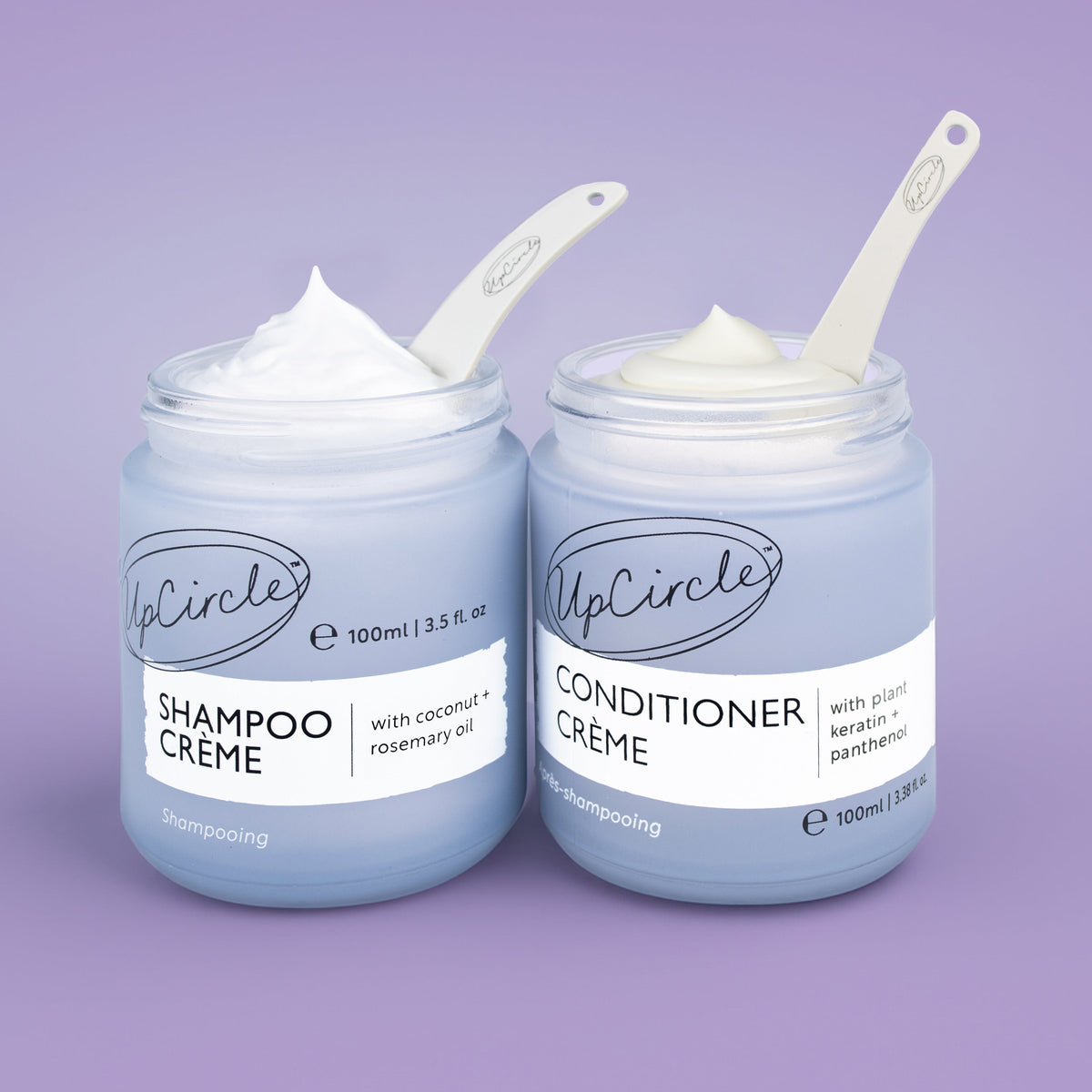 The Haircare Duo by UpCircle: Shampoo Creme + Conditioner Creme jars with white spatulas on Tampa Home & Garden Store