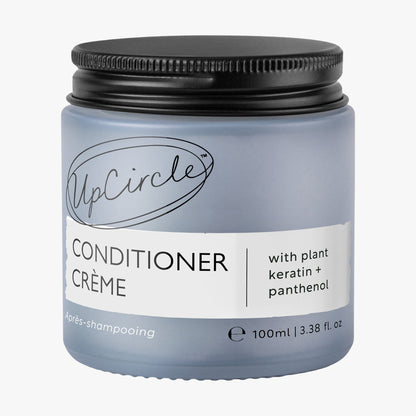 UpCircle Conditioner Crème with plant keratin + panthenol, light blue bottle, black cap on Tampa Home & Garden Store