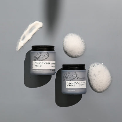 UpCircle haircare duo: shampoo & conditioner in gray with black lids on Tampa Home & Garden Store on Tampa Home & Garden Store