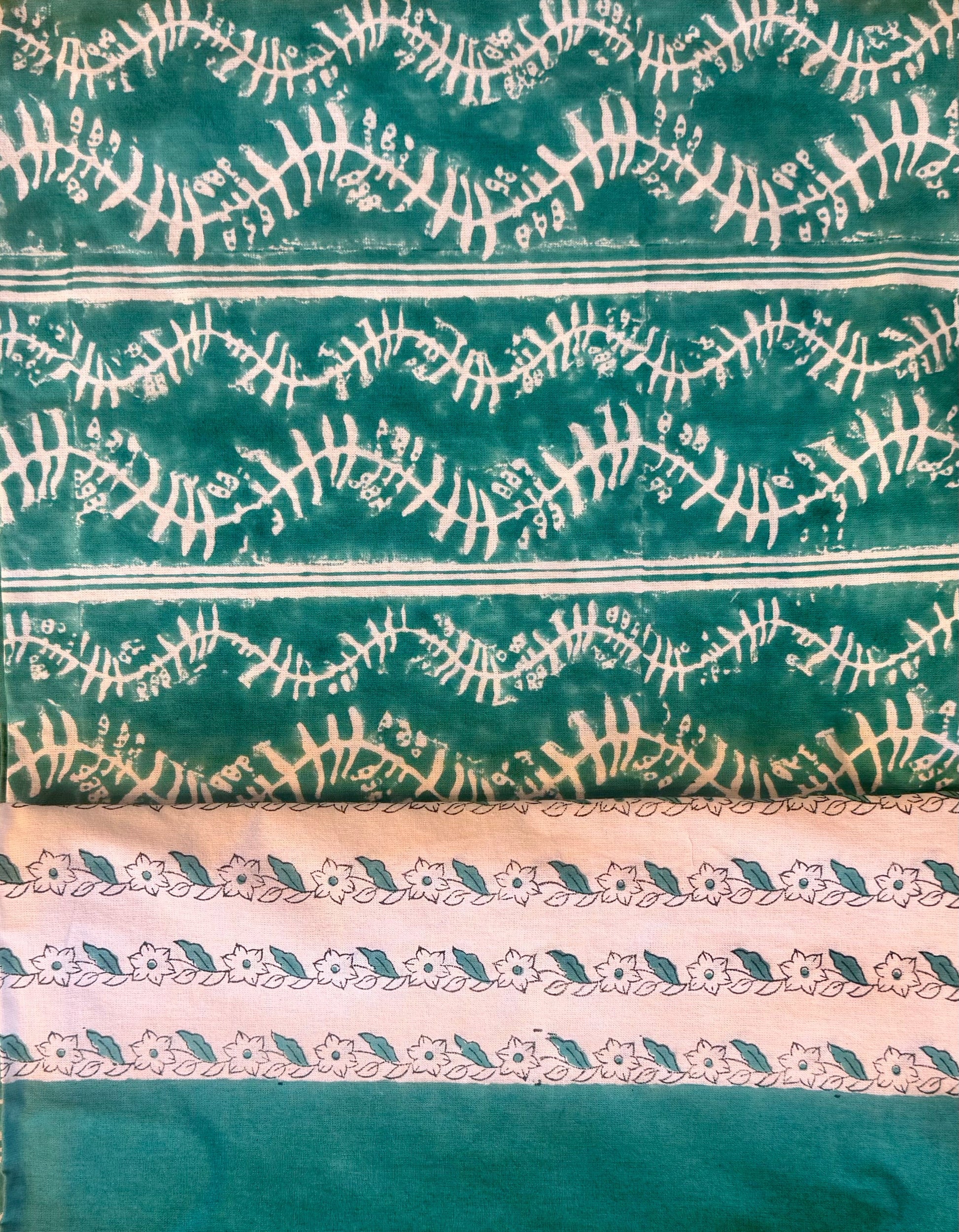 Tablecloth Bluebell Emerald teal-green base with white botanical print and striped border on Tampa Home & Garden Store