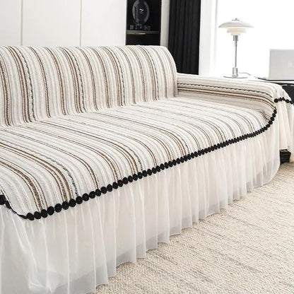 Striped sofa cover with white pleated skirt and black pom-pom trim by FLIPSTYLEZLLC on Tampa Home & Garden Store