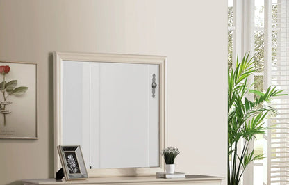 Traditional Wall Mirror and Wood Veneer Frame with cream finish on beige wall beside a plant on Tampa Home & Garden Store