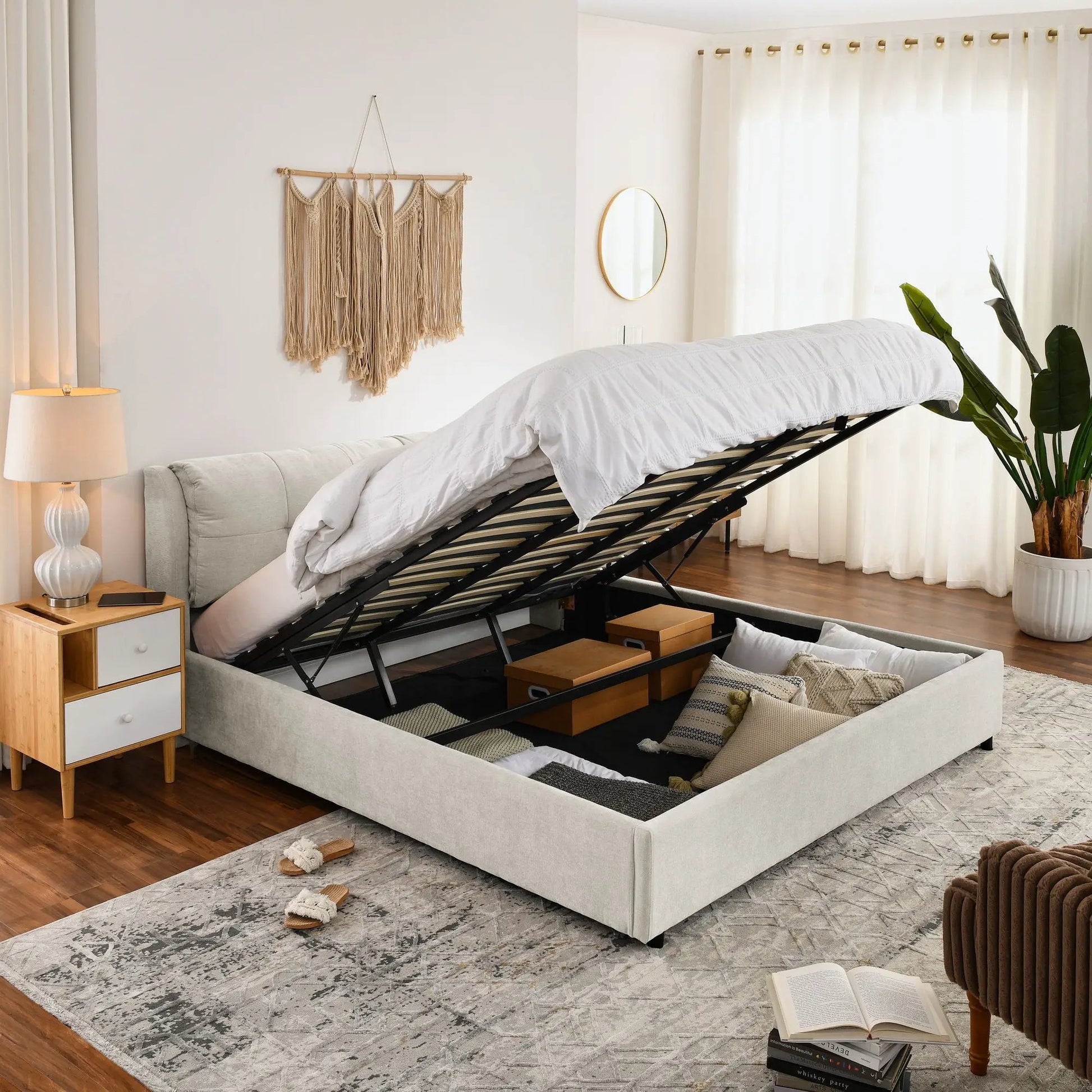 Storage upholstered hydraulic platform bed with integrated headboard in light gray fabric on Tampa Home & Garden Store