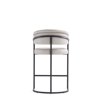 Augusta Counter Stool by HouseOfZazla, cream leather cushions on a black metal frame on Tampa Home & Garden Store