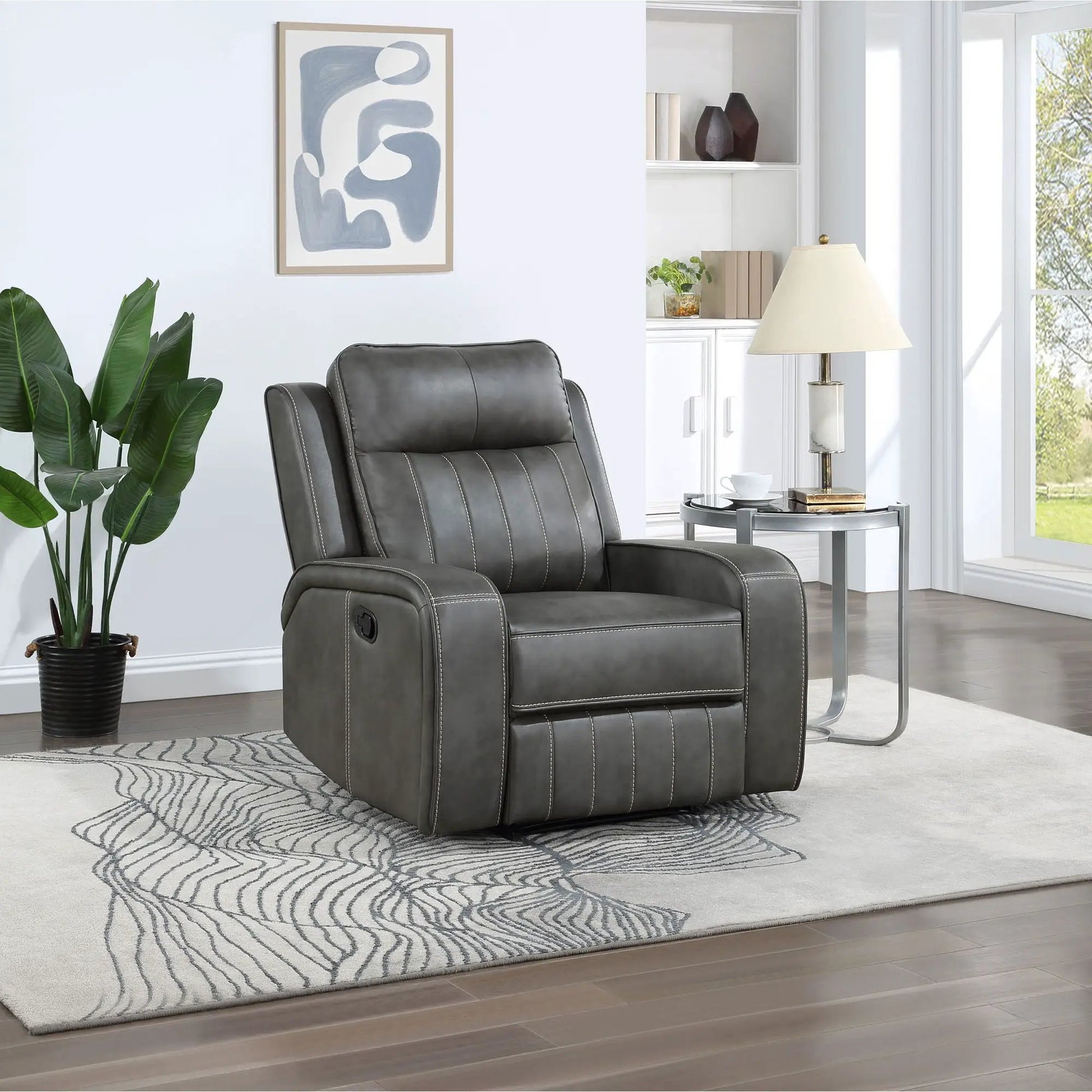 Forrest gray tufted recliner chair by Unique Piece Furniture in a bright living room on Tampa Home & Garden Store