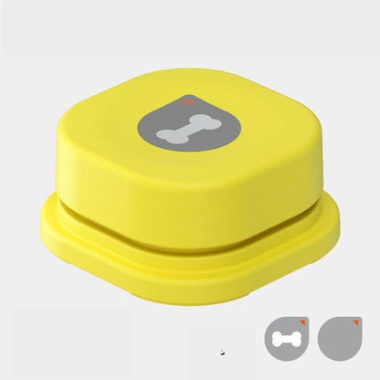 Yellow pet communication button with gray bone icon; plastic square device on Tampa Home & Garden Store