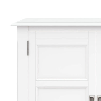 White Burlington handcrafted low storage cabinet with paneled doors and silver hinge on Tampa Home & Garden Store