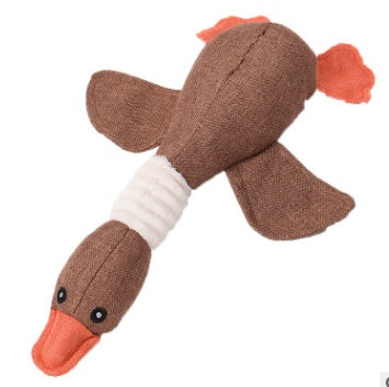 Dayan plush bird dog toy, brown body with orange beak and tail, white ribbed neck on Tampa Home & Garden Store