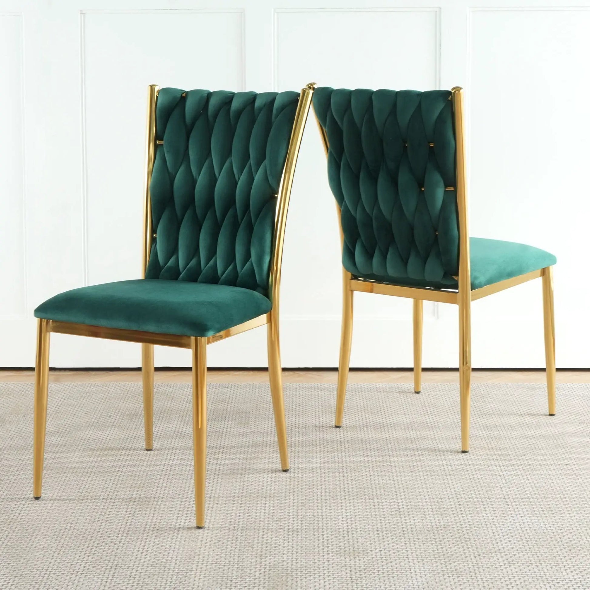 2 modern dining chairs with emerald velvet tufted backs and gold metal frames on Tampa Home & Garden Store
