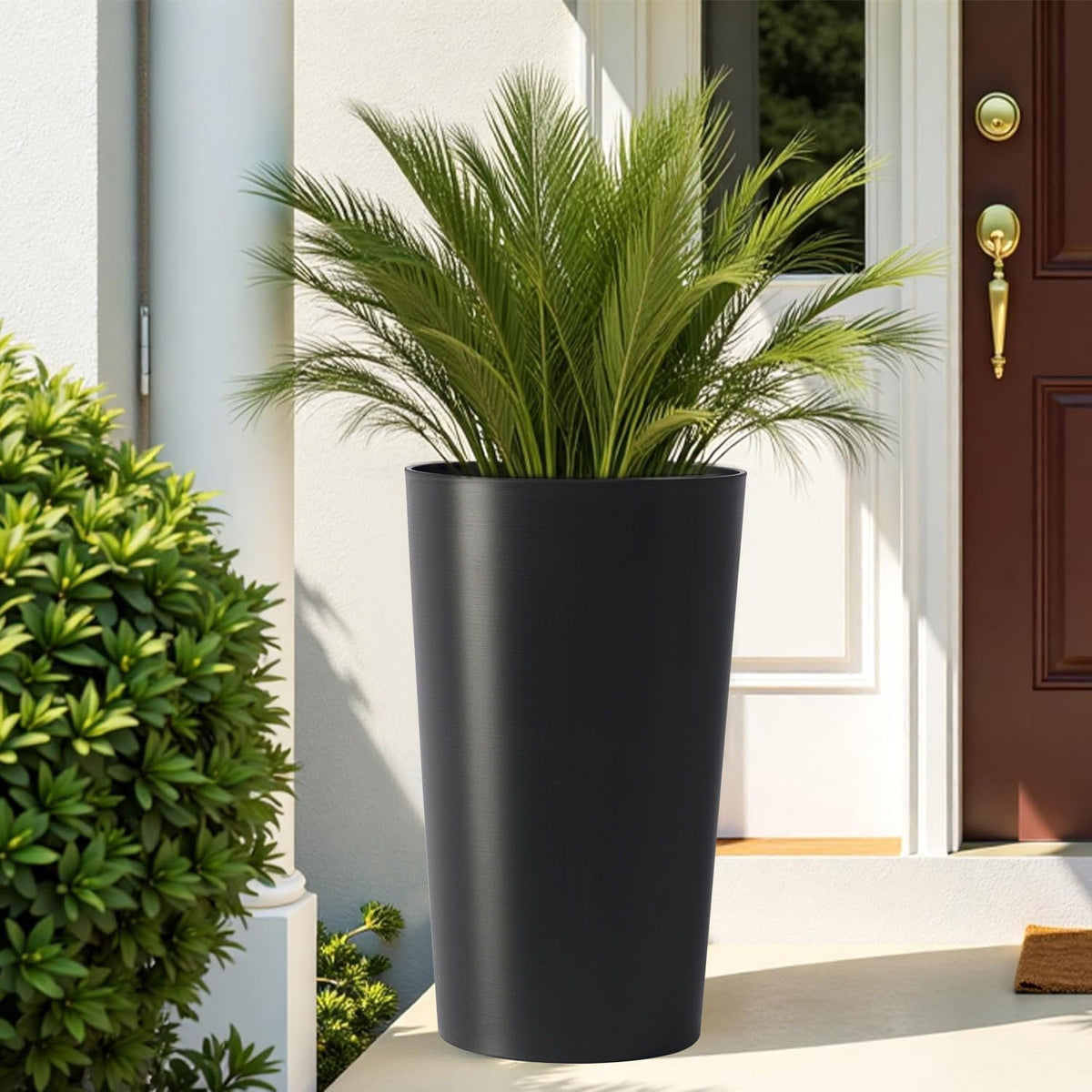 Planter For Outdoor HouseOfZazla: tall matte black planter with lush palm plant at entry on Tampa Home & Garden Store