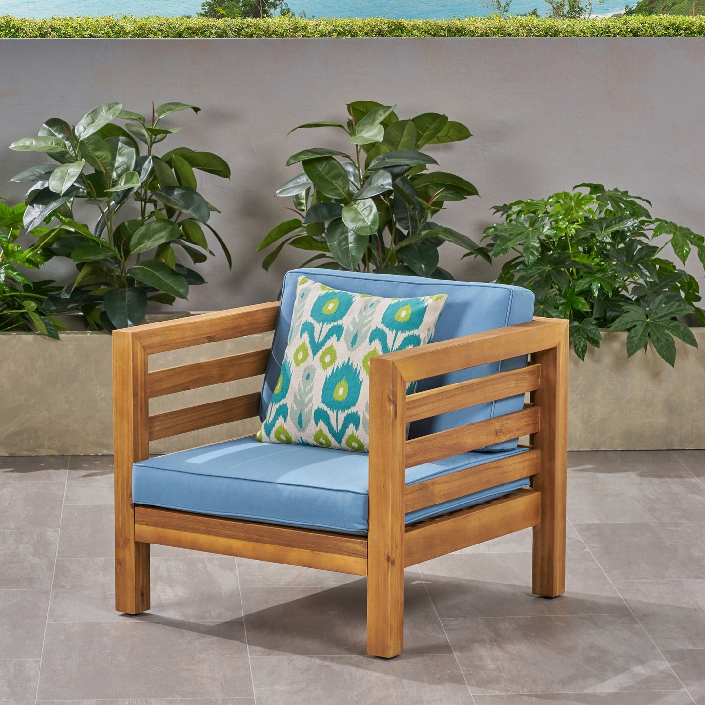 Outdoor acacia wood patio arm chair with blue fabric cushions and pillow HouseOfZazla on Tampa Home & Garden Store