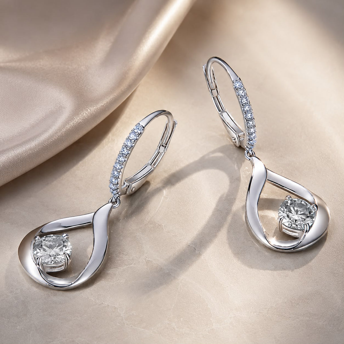 Pair of Sterling moissanite drop earrings with pave hoop and teardrop shape, 0.5ct, by Bids.com on Tampa Home & Garden Store