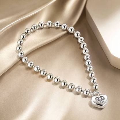 Sterling silver beaded bracelet with pavé CZ heart charm, platinum plated, 17cm on Tampa Home & Garden Store