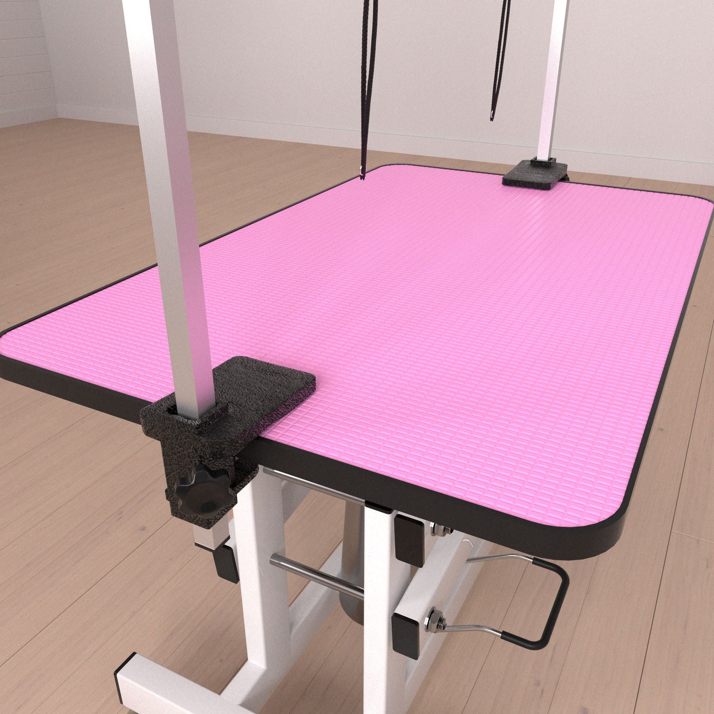 Hydraulic pet grooming table with H-arm, pink textured non-slip mat, black restraints on Tampa Home & Garden Store