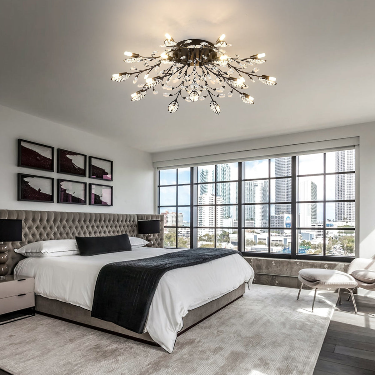 15-Light Crystal Chandelier with black metal branches and teardrop crystals in a bedroom on Tampa Home & Garden Store