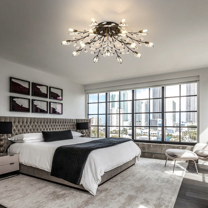 15-Light Crystal Chandelier with black metal branches and teardrop crystals in a bedroom on Tampa Home & Garden Store