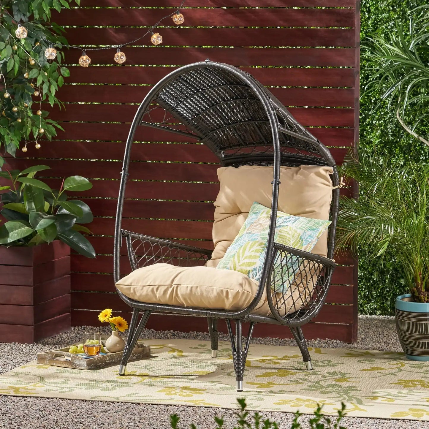 Outdoor wicker standing basket chair with beige cushion, HouseOfZazla club chair on Tampa Home & Garden Store