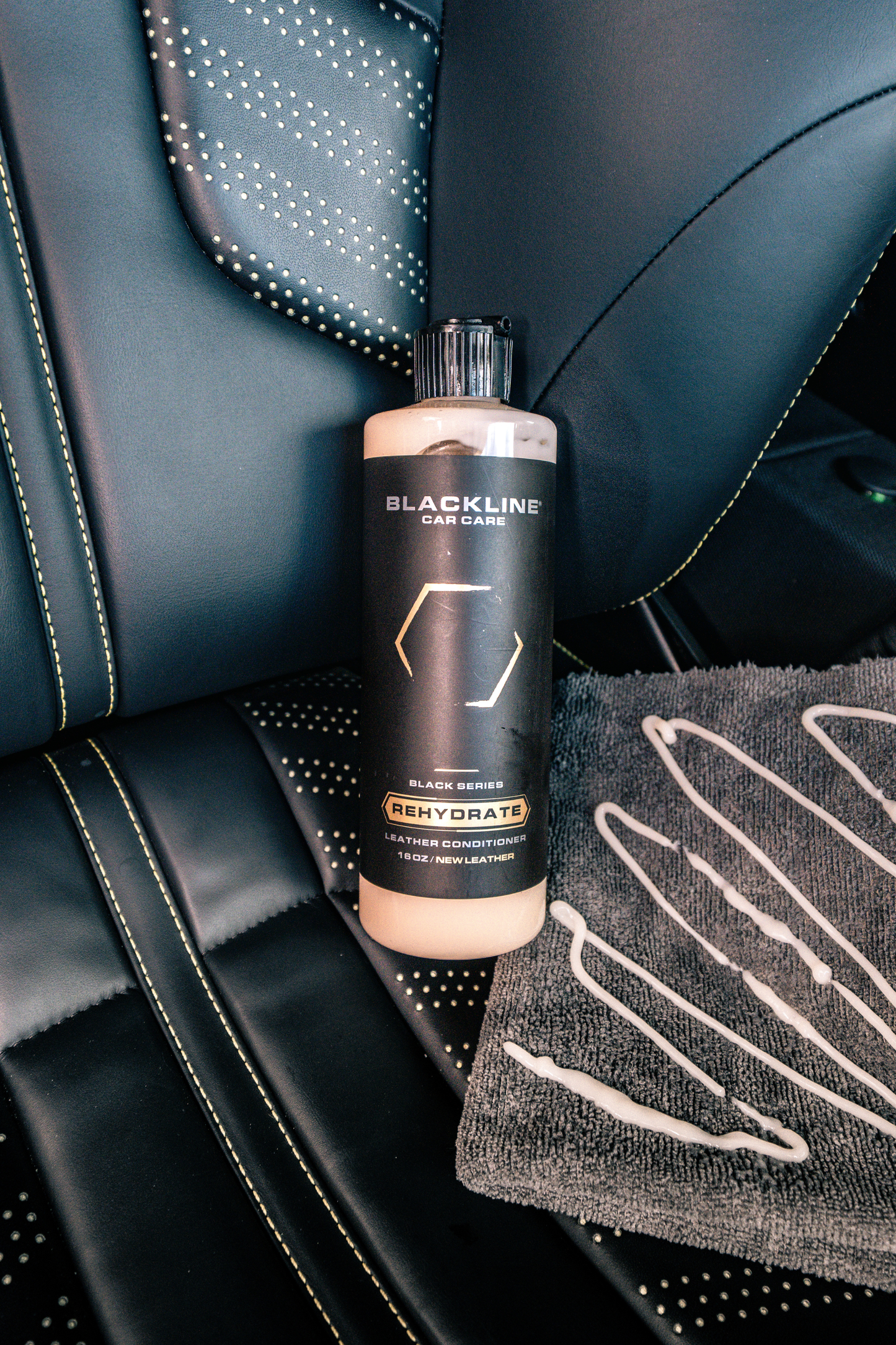 BLACKLINE Car Care Gentle APC all purpose cleaner bottle on tan car seat interior on Tampa Home & Garden Store