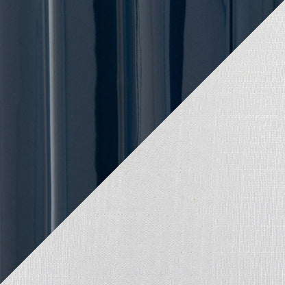Stella table lamp navy finish with glossy surface on left; diagonal white textured backdrop on Tampa Home & Garden Store