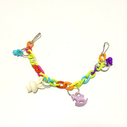 Parrot acrylic chain suspension bridge swing toy with rainbow links and charms on Tampa Home & Garden Store
