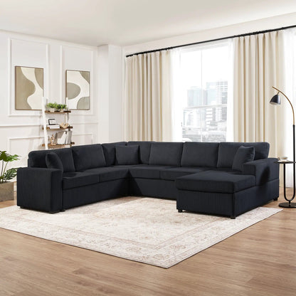 Oversized U-shaped sectional sofa with chaise lounge in dark navy fabric and three soft throw pillows on Tampa Home & Garden Store